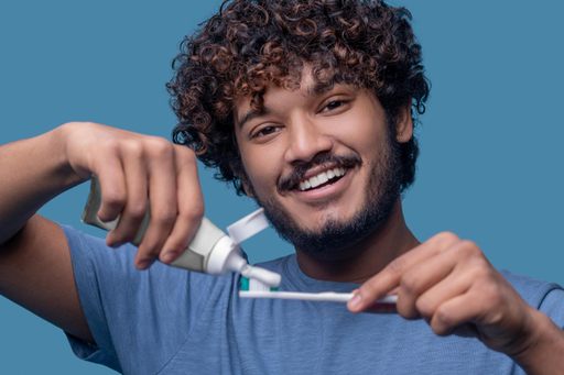 joyous-male-looking-camera-before-tooth-brushing-p